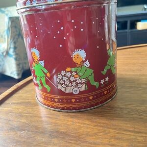 Vintage Karen Volf Red Holiday Angel Tin Canister with Floral Wagon Design